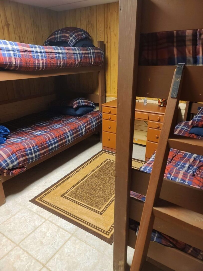 bunk beds with plaid sheets