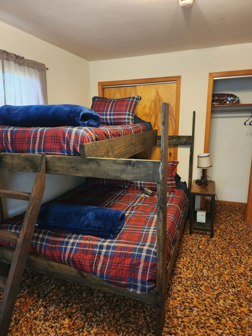 Single Wooden Bunk Beds in The Room