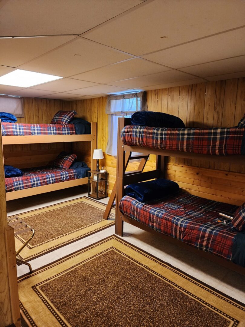 Two Wooden Bunk Beds in the Room