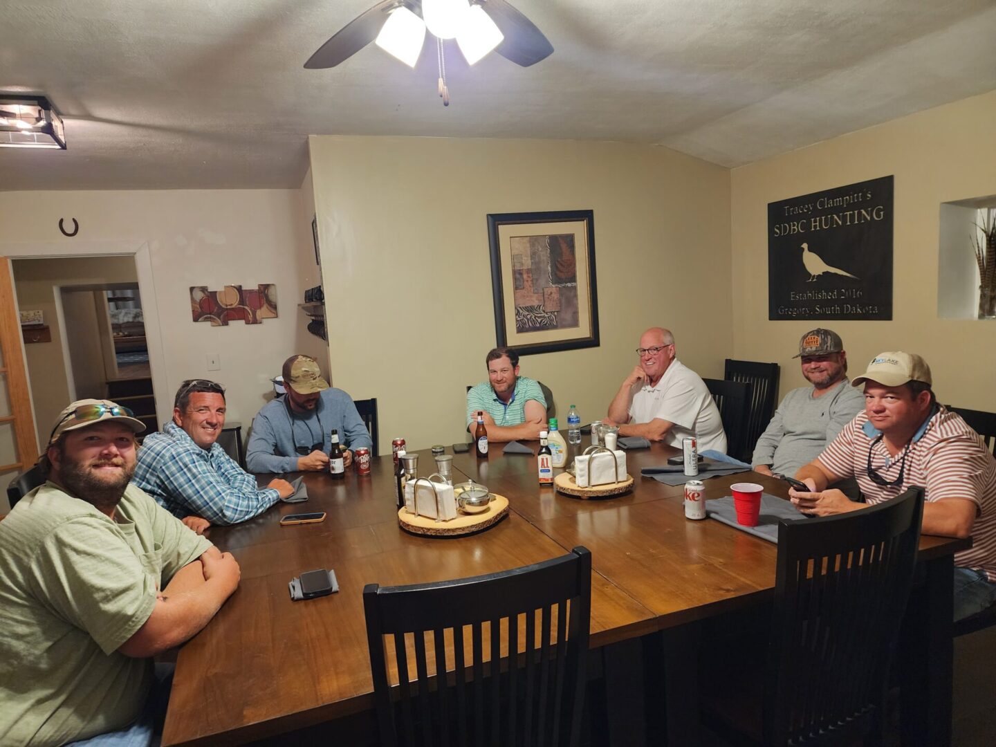 Hunting Team Sitting on Dining Table