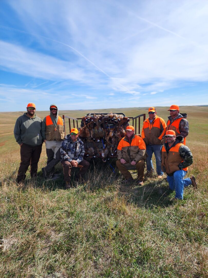 Hunting Team with Birds in the Truck