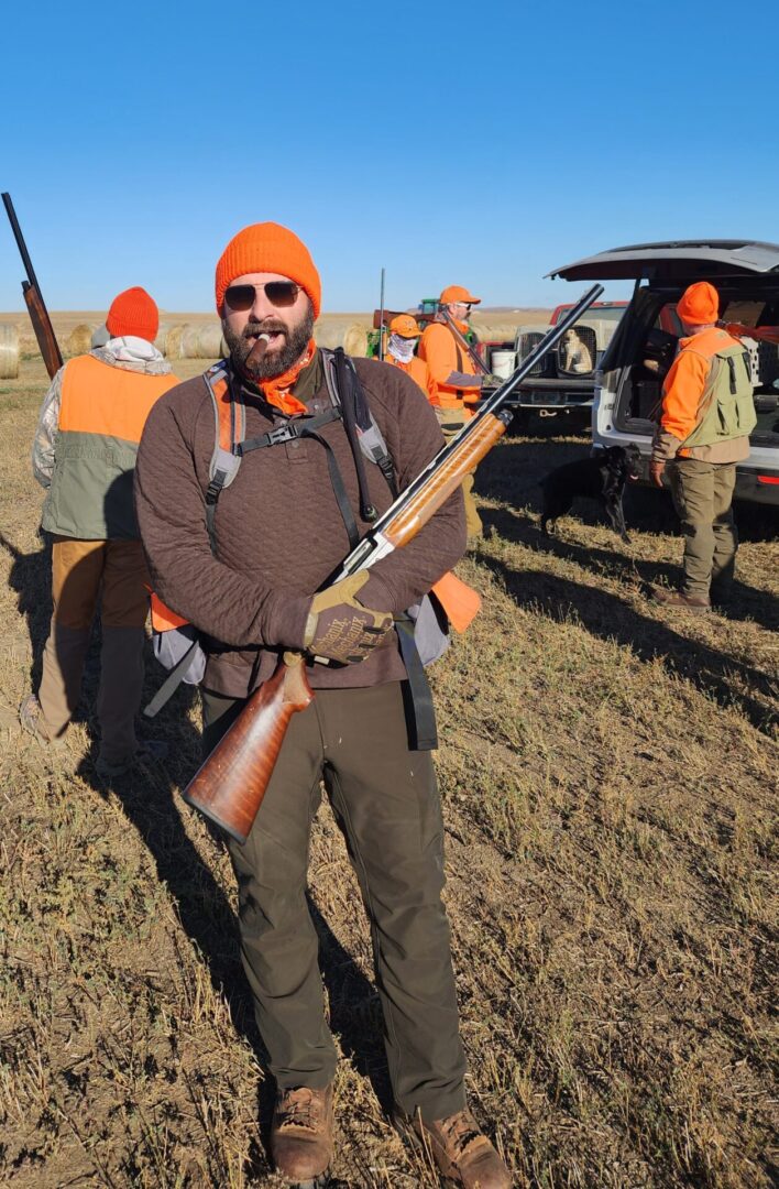 Hunter Man With Gun on The Field