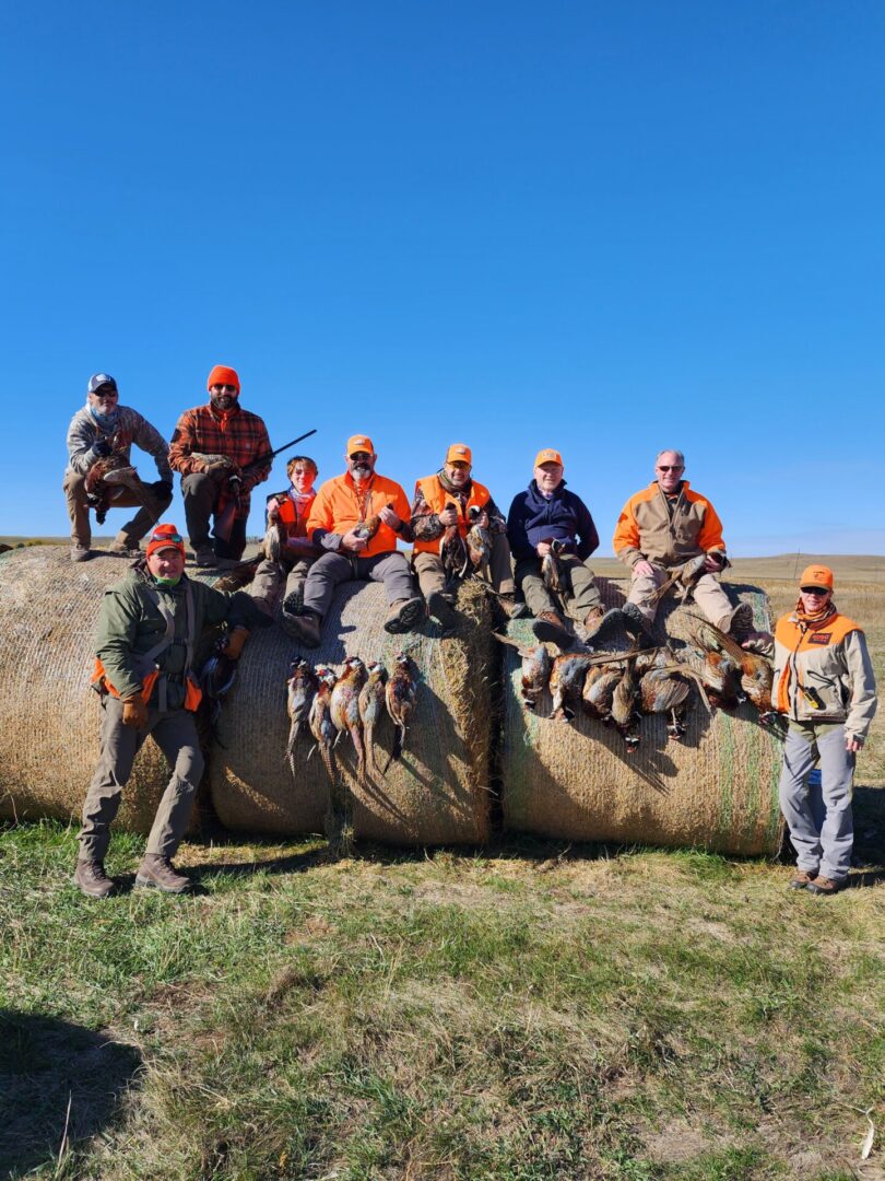 Group of Hunting Team with Birds