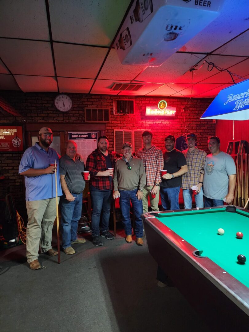 Hunting Team Playing a Billiards Game