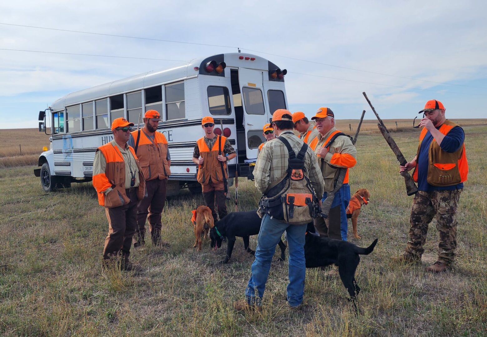 Hunters Sitting on Back Side of The Truck