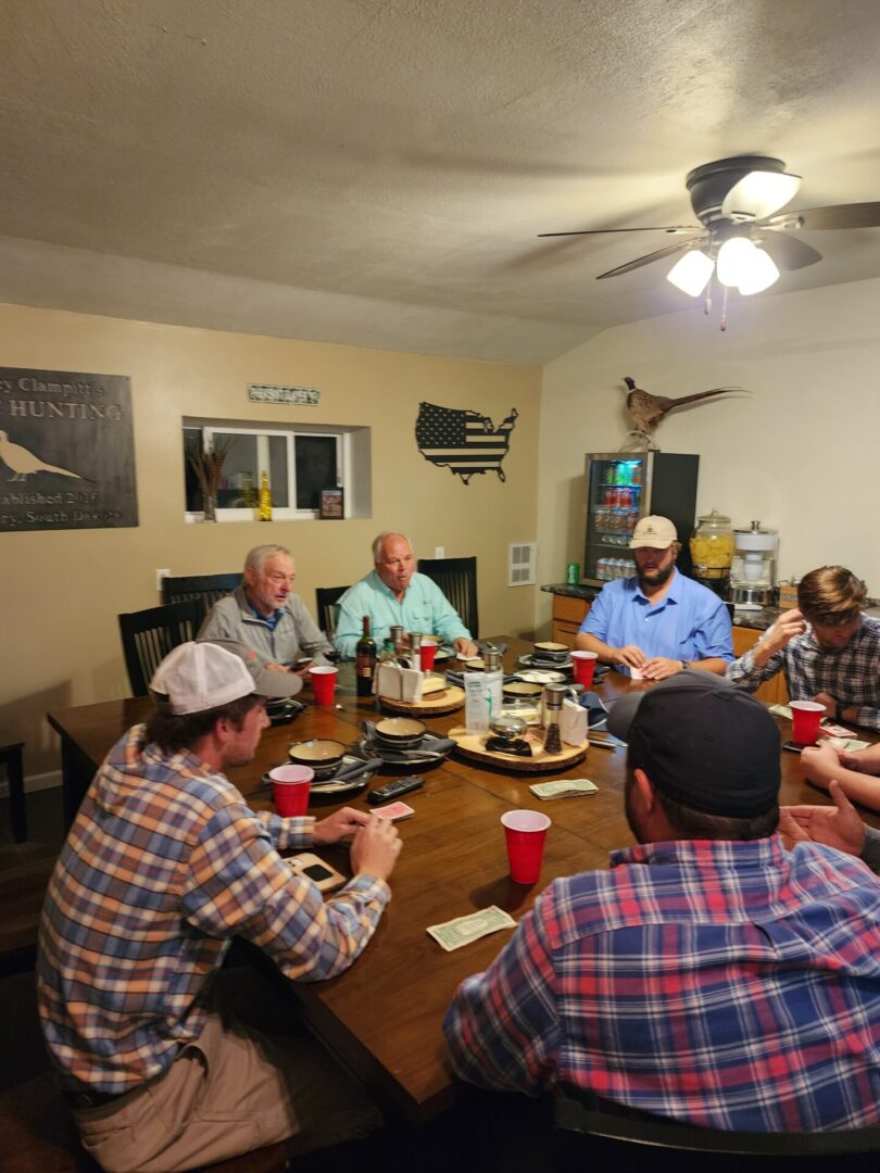 People are Enjoying The Food With Hunting Team