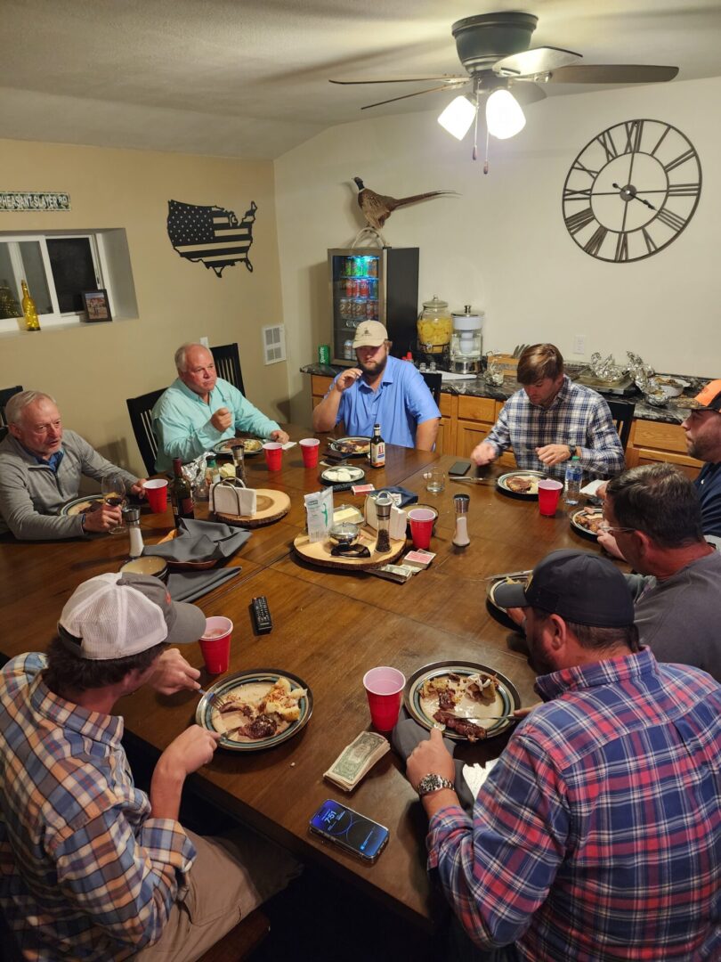 The Group of People Having Food at Hunting Field