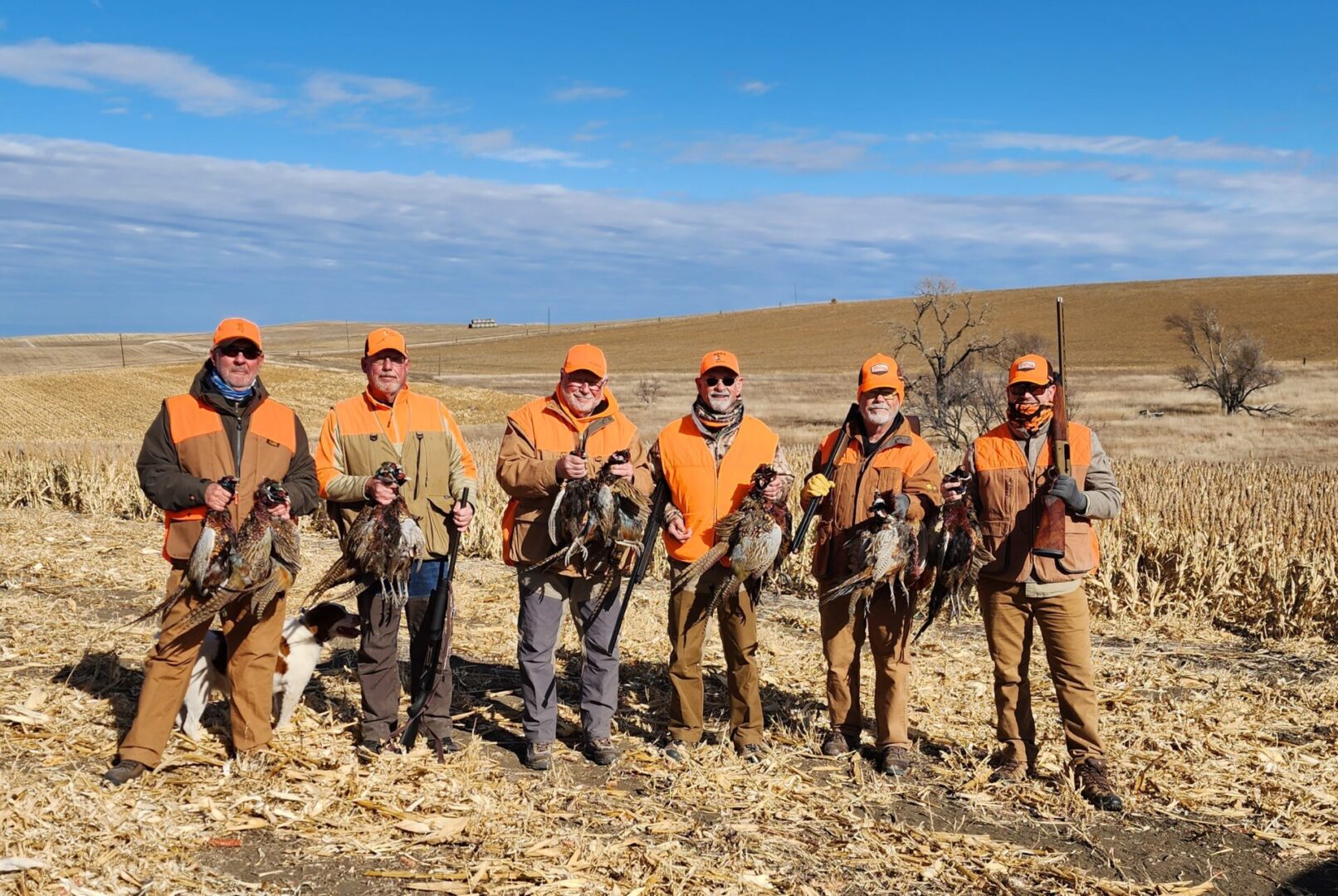 Hunters on The Field With Birds and Guns