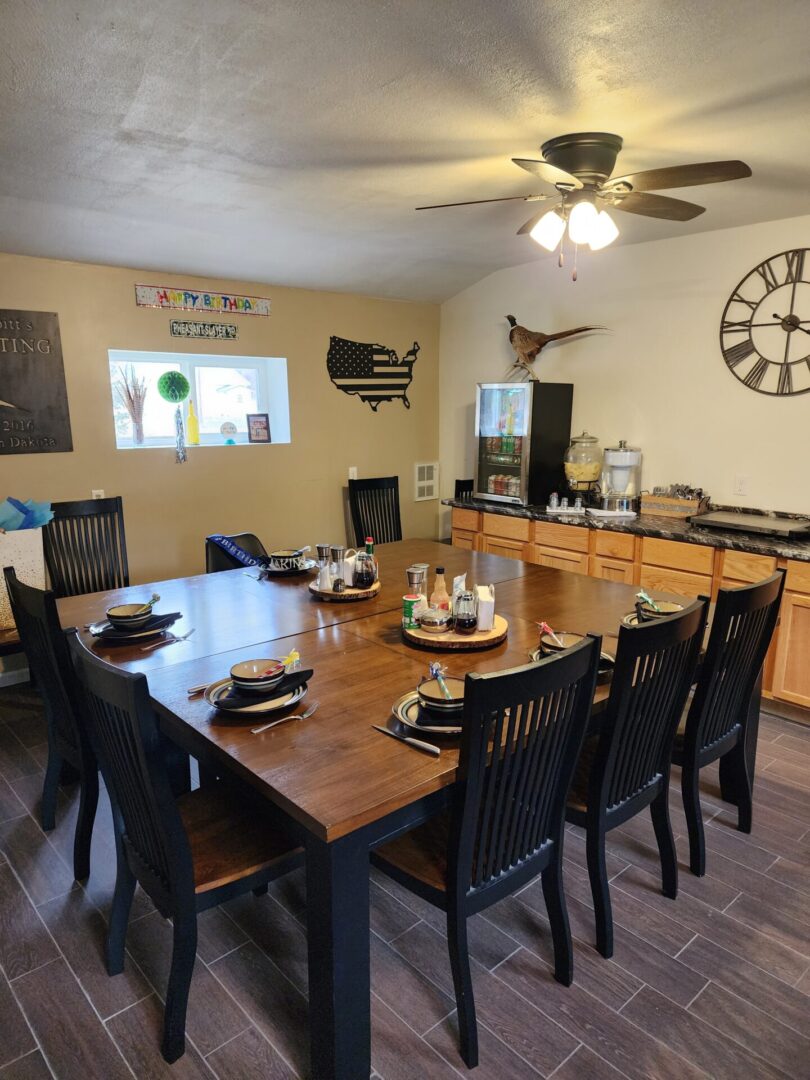 The Wooden Dining Table With Chairs